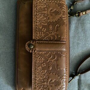 The Sak embossed leather cross body purse wristlet with strap tan leather